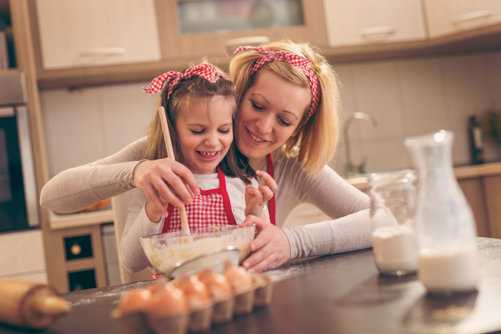 mother-teaching-daughter-to-knead-dough-2025-03-13-05-19-25-utc